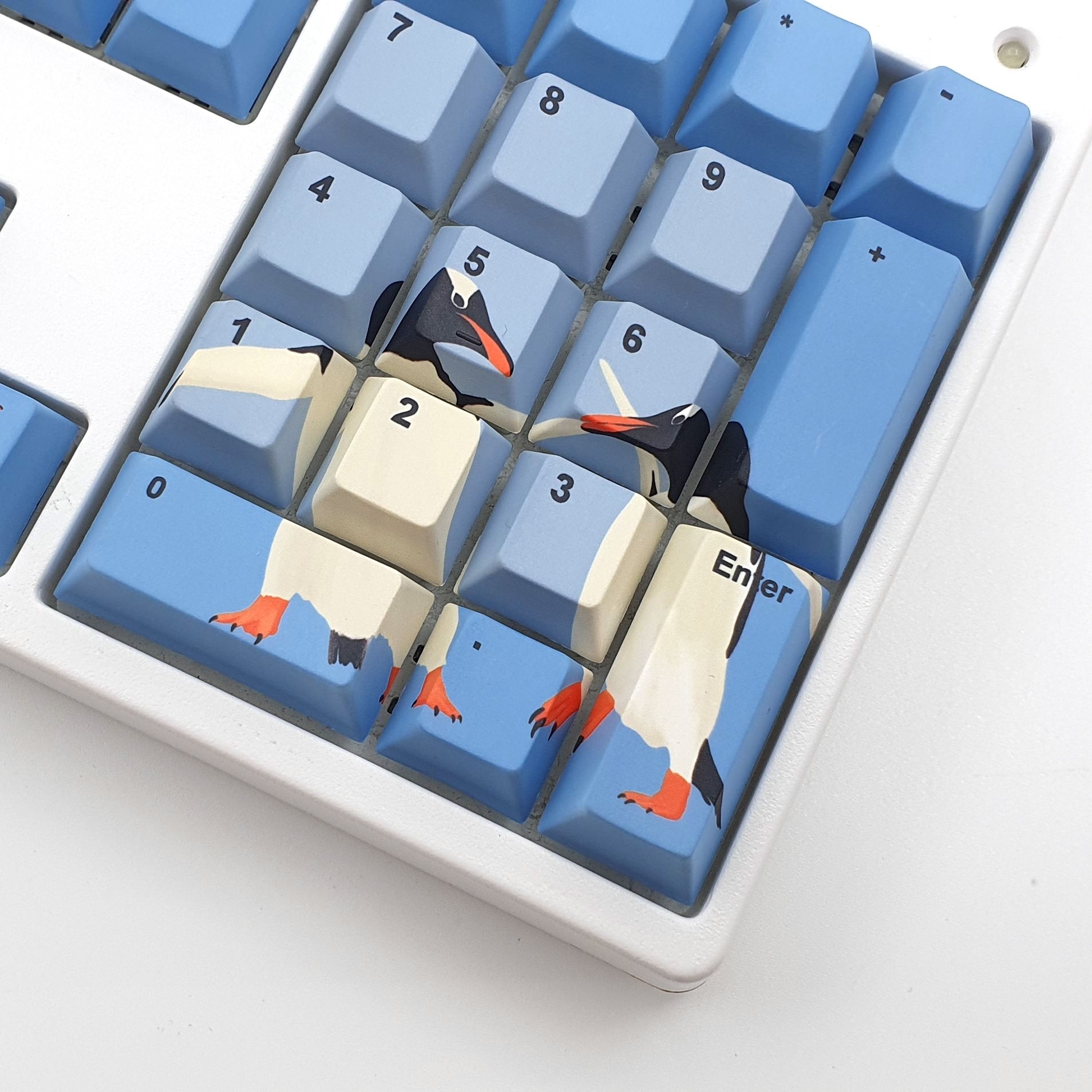 Penguins artist keycap set by Sunette